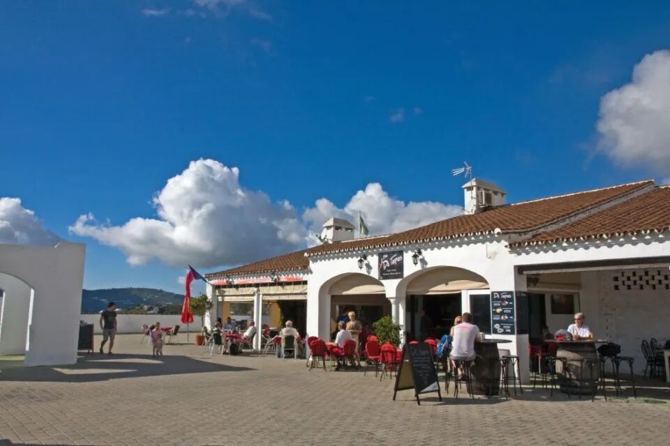 Town square with a bar and restaurant in Frigiliana, near Nerja, Andalucia, Spain.